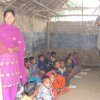 rib chairman talking with the children at barapara center at boda in panchogharh
